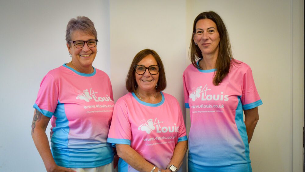 Members of Allied Protek staff wearing 4Louis charity t-shirts ahead of their skydive.